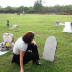 Punta Gorda Ghost Tour Paranormal Researcher Erin Broemel Reads a Headstone